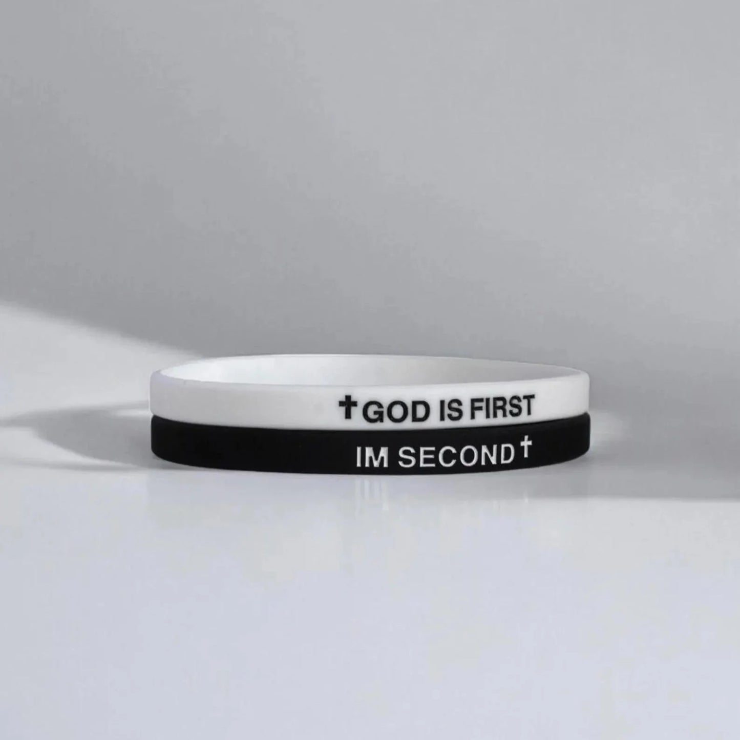 Covenant Co. — "God Is First, I'm Second" Silicone Bracelet Set (Pack of 2)